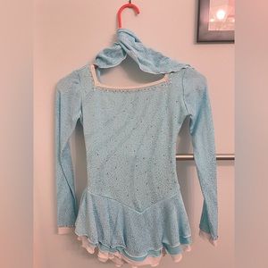 Figure skating competition outfit with neckties or hair tie.